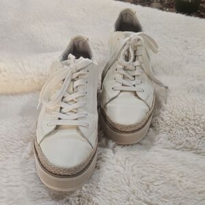 Dolce Vita Tinley: A classic white leather platform sneaker with the rope-wrappe